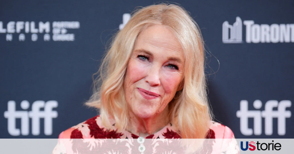 Catherine O'Hara smiling on a movie set in 2026