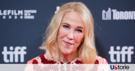 Catherine O'Hara smiling on a movie set in 2026