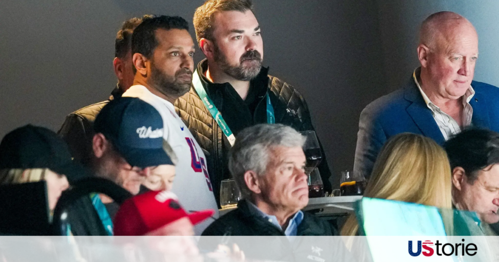 FBI Director Kash Patel celebrating with Team USA hockey players in the Milan locker room.