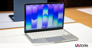 The new MacBook Neo in Midnight and Starlight colors, showing its slim profile and USB-C ports.