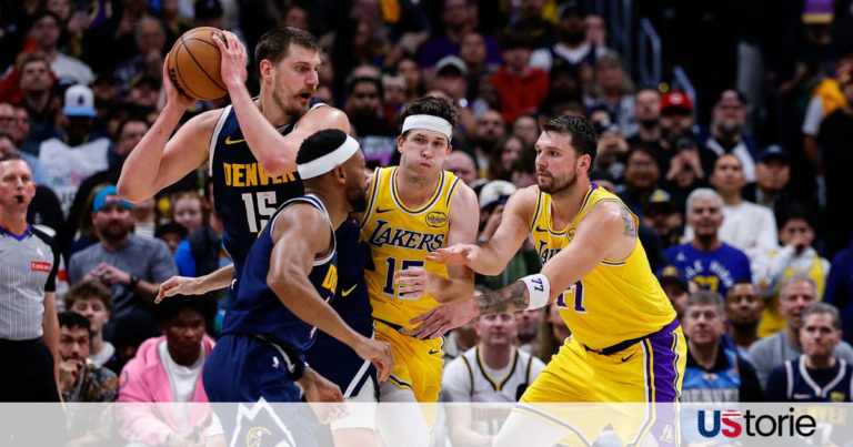 LeBron James and Luka Doncic high-fiving during a 2026 Lakers home game at Crypto.com Arena,