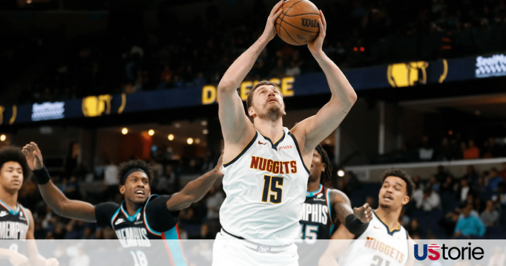 Nikola Jokic battling Kevin Durant in the paint during the high-stakes Nuggets vs Suns game in March 2026.